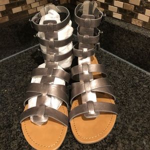Silver/pewter, new never worn gladiator sandals.
